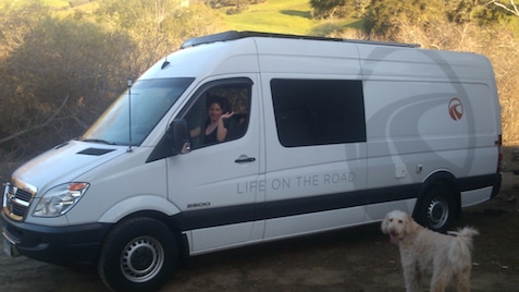 Photo of Amira driving the mobile unit.